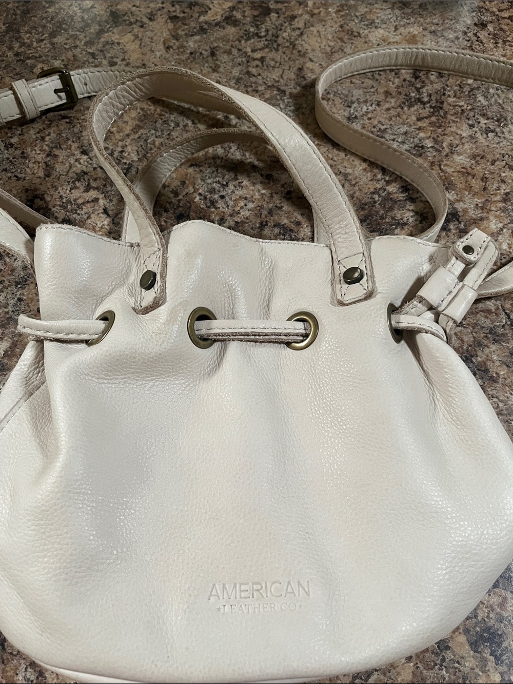 American Leather small drawstring bucket leather cream bag purse double handles